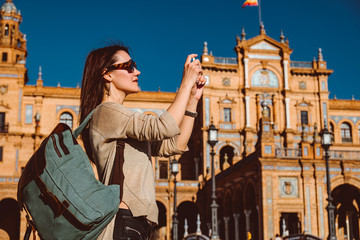 Female backpacker visits Seville, Spain. European backpacking adventure. - 267034443