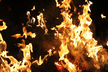Fire sparks black background, burn effect, burning fire and smoke, sparks fire background. 