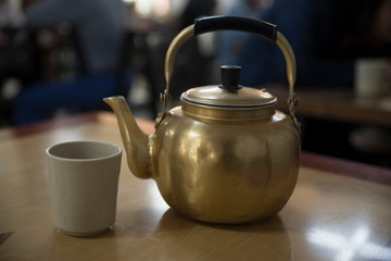 teapot on wooden table