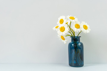 Bouquet of daisies in a glass vase