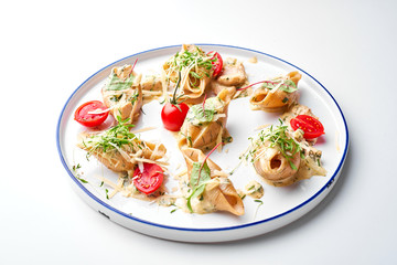 Stuffed pasta shells with Oregano & tomatoes