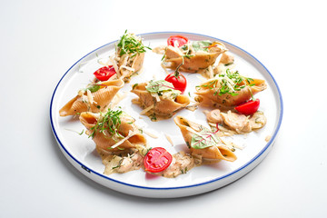 Stuffed pasta shells with Oregano & tomatoes