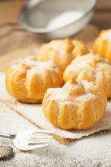 Profiteroles, choux pastry balls filled cream  