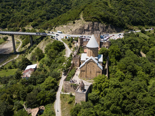 Fototapeta na wymiar Famous georgian sightseeing - Aerial view to Ananuri castle complex