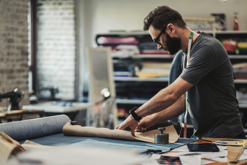 Fashion designer working in his studio