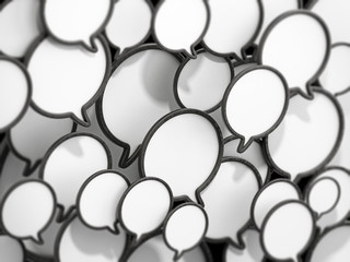 Black and white speech balloons forming a background. 3D illustration