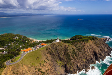 Naklejka premium aerial view of Wategoes Beach at Byron Bay with lighthouse. The Photo was taken out of a Gyrocopter, Byron Bay, Queensland, Australia