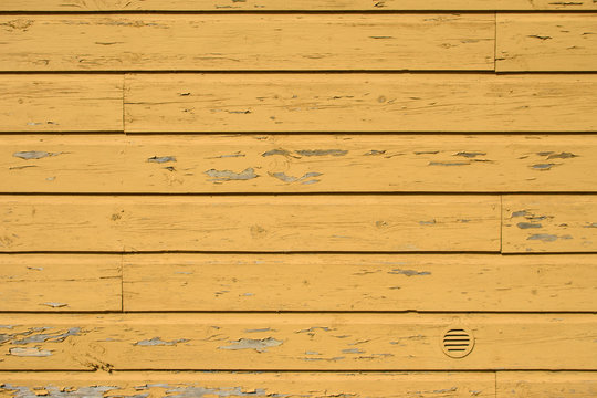Yellow wooden background.