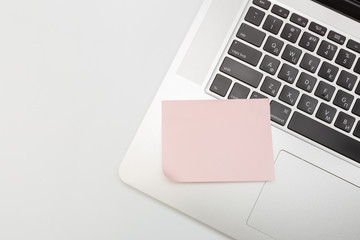 Sticky note on laptop with copy space. For all concept