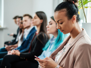 Group of young people waiting for a casting or job interview