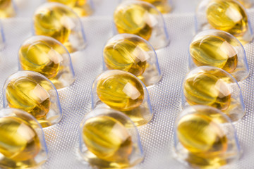 Blister pack of fish oil capsules close up view