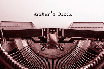 Writers Block printed on a sheet of paper on a vintage typewriter. writer. literature.