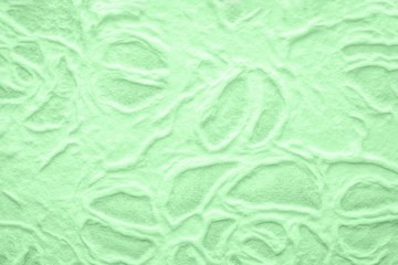Handmade mulberry paper texture background. Green mint color paper