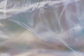 The texture of the transparent polyethylene package. a surface covered with multiple layers of  cellophane.