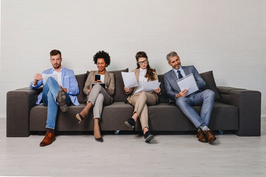Diverse business people waiting for an interview