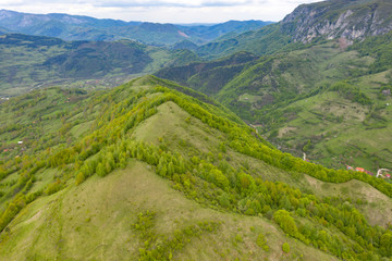 Fototapeta na wymiar Transylvania countryside hills, stunning aerial view in spring.