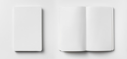 white notebook isolated on white background - obrazy, fototapety, plakaty