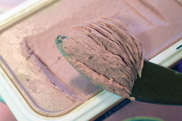 Close up knife with liver pate.