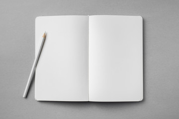 white notebook isolated on grey background