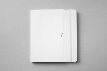 white notebook with case on grey for mock up
