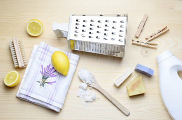 Eco friendly natural cleaners, washing soda, lemon, crystalic salt on a wooden background. Europe,...