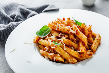 Bolognese penne pasta served on plate