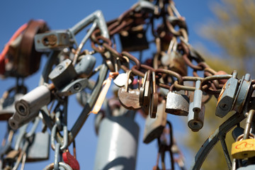 Fototapeta na wymiar Lock up love. Traditions. Bridge with a lock of love and happiness.