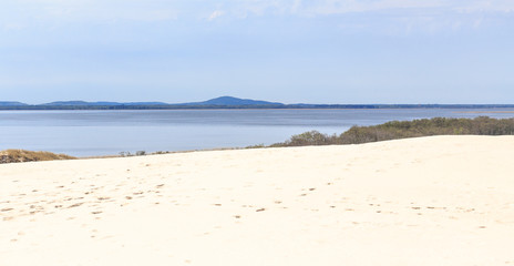 View of Lebsko lake and  Rowokol hill from Lacka dune in the Slowinski National Park near Łeba, on  Polish coast of Baltic Sea