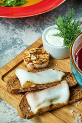 Red soup. Beautiful serving dishes. Restaurant menu