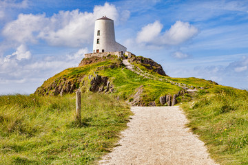 Fototapeta na wymiar Twr Mawr, the old lighthouse on the tidal island of Ynys Llanddwyn, Newborough, Anglesey, Wales, UK
