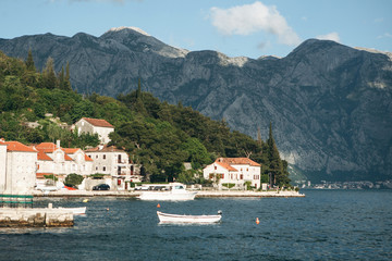Beautiful view of the old coastal town of Perast in Montenegro with beautiful architecture, the sea...