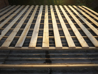 roof repair elements - wooden planks and boards for covering with metal slates