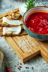 Red soup. Beautiful serving dishes. Restaurant menu