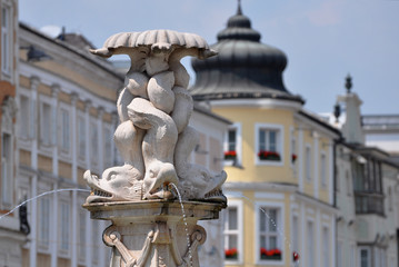 Fototapeta premium Close up of Neptunbrunnen fountain on Hauptplatz square, Linz, Austria