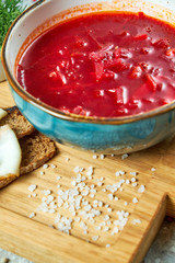 Red soup. Beautiful serving dishes. Restaurant menu