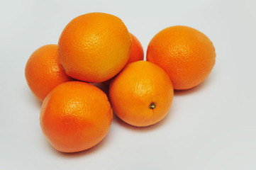 Fresh oranges isolated on the gray background