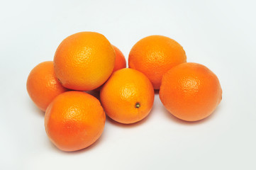 Fresh oranges isolated on the gray background