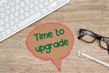 Text Time to upgrade typed on speech bubble