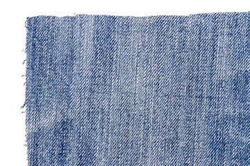 Piece of light blue jeans fabric