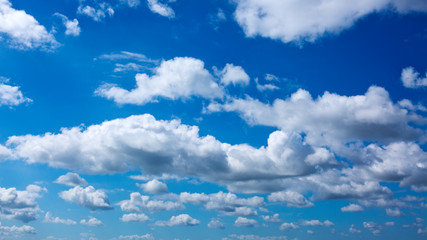 Obraz premium White clouds in blue sky.Summer nature background.