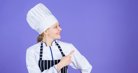 She will show you her high class cooking. Sensual cook pointing and looking away. Pretty chef...