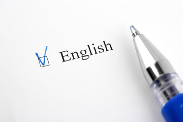 English. Filling in the questionnaire, documents. The checkboxes are filled with a black pen on a white background. Questionnaire, survey.