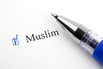 Muslim. Filling in the questionnaire, documents. The checkboxes are filled with a black pen on a white background. Questionnaire, survey.