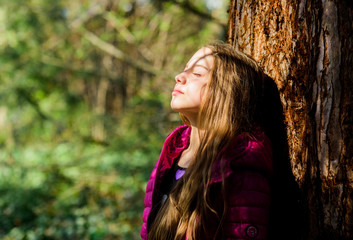 Girl walk in botanical garden. Enjoying nature. Peaceful environment garden. Kid cute fancy child spend time in park. Explore garden. Excursion to botanical garden. Plants grown for display to public