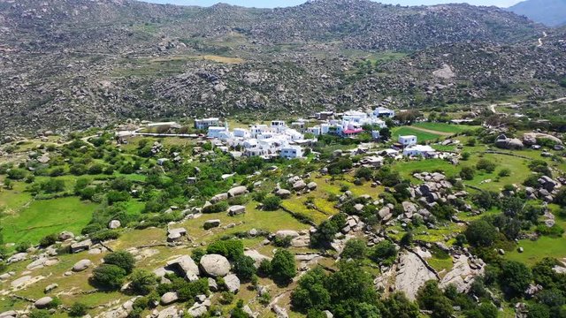 Aerial drone video of Lunar landscape with big round granite stones a unique geological phenomenon in Volax village, Tinos island, Cyclades, Greece