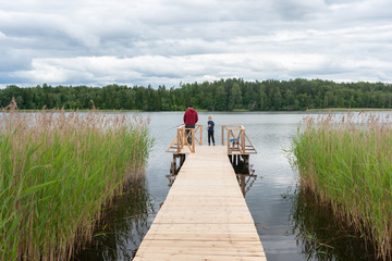 fishermans  at lake Zvirgzdu in the Latvia