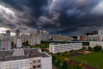 Thunderclouds in the sky over the city