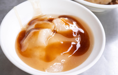 Bawan (Ba wan), taiwanese meatball delicacy, delicious street food, fried starch wrapped round shaped dumpling with pork inside, close up, copy space