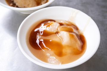 Bawan (Ba wan), taiwanese meatball delicacy, delicious street food, fried starch wrapped round shaped dumpling with pork inside, close up, copy space