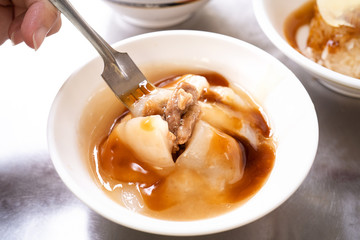 Bawan (Ba wan), taiwanese meatball delicacy, delicious street food, fried starch wrapped round shaped dumpling with pork inside, close up, copy space